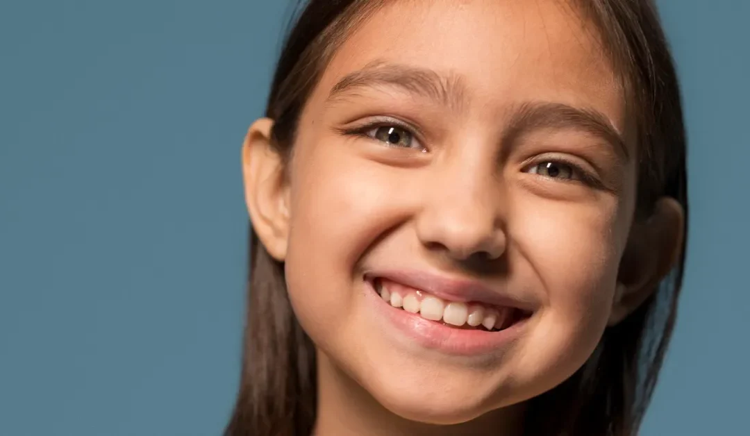 Why Are My Child’s Teeth Yellow? Causes & Solutions Explained